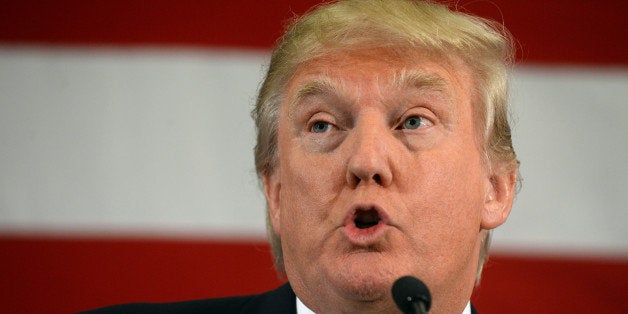 NASHUA, NH - APRIL 18: Donald Trump speaks at the First in the Nation Republican Leadership Summit April 18, 2015 in Nashua, New Hampshire. The Summit brought together local and national Republicans and was attended by all the Republicans candidates as well as those eyeing a run for the nomination. (Photo by Darren McCollester/Getty Images)