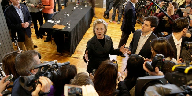 Democratic presidential candidate Hillary Rodham Clinton speaks to members of the media after meeting with small business owners, Tuesday, May 19, 2015, at the Bike Tech cycling shop in Cedar Falls, Iowa. (AP Photo/Charlie Neibergall)