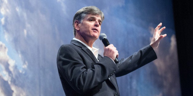 Political commentator Sean Hannity addresses the crowd while delivering his speech, "Get America Back to Work", Thursday, May 22, 2014, during the 22nd Williston Basin Petroleum Conference held in Bismarck, N.D. (AP Photo/Kevin Cederstrom)