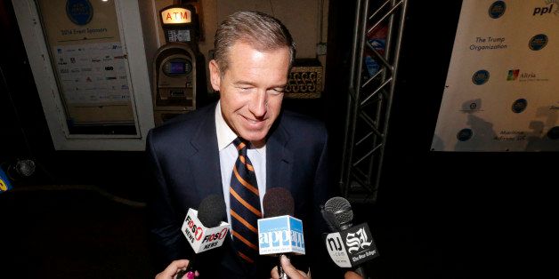 Television journalist Brian Williams arrives at the Asbury Park Convention Hall during red carpet arrivals prior to the New Jersey Hall of Fame inductions, Thursday, Nov. 13, 2014, in Asbury Park, N.J. Williams will be inducted into the hall of fame along with actor James Gandolfini, who played the lead role in the cable series The Sopranos. (AP Photo/Julio Cortez)