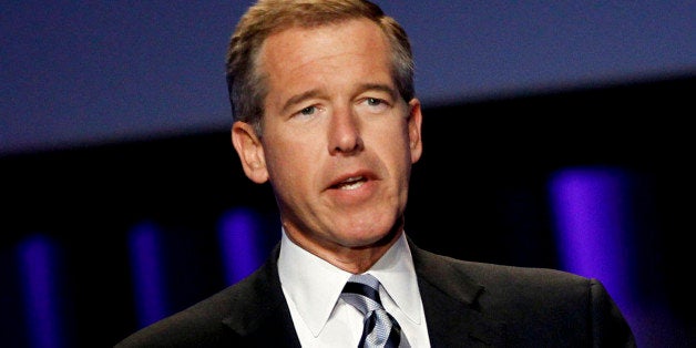 FILE - In this Oct. 26, 2010 file photo, Brian Williams, anchor and managing editor of "NBC Nightly News," speaks at the Women's Conference in Long Beach, Calif. NBC says it is suspending Brian Williams as "Nightly News" anchor and managing editor for six months without pay for misleading the public about his experiences covering the Iraq War. NBC chief executive Steve Burke said Tuesday, Feb. 10, 2015, that Williams' actions were inexcusable and jeopardized the trust he has built up with viewers during his decade as the network's lead anchor. (AP Photo/Matt Sayles, File)