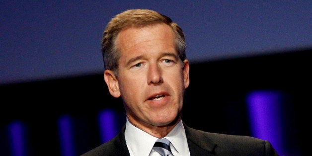 FILE - In this Oct. 26, 2010 file photo, Brian Williams, anchor and managing editor of "NBC Nightly News," speaks at the Women's Conference in Long Beach, Calif. NBC says it is suspending Brian Williams as "Nightly News" anchor and managing editor for six months without pay for misleading the public about his experiences covering the Iraq War. NBC chief executive Steve Burke said Tuesday, Feb. 10, 2015, that Williams' actions were inexcusable and jeopardized the trust he has built up with viewers during his decade as the network's lead anchor. (AP Photo/Matt Sayles, File)