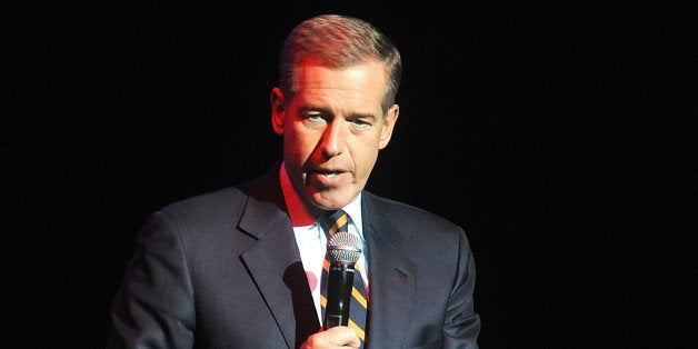 FILE - In this Nov. 5, 2014 file photo, Brian Williams speaks at the 8th Annual Stand Up For Heroes, presented by New York Comedy Festival and The Bob Woodruff Foundation in New York. Williams has admitted he spread a false story about being on a helicopter that came under enemy fire while he was reporting in Iraq in 2003. Williams said he was in a helicopter following other aircraft, one of which was hit by ground fire. His helicopter was not hit. NBC News was not commenting Thursday about whether its top on-air personality would face disciplinary action. (Photo by Brad Barket/Invision/AP, File)