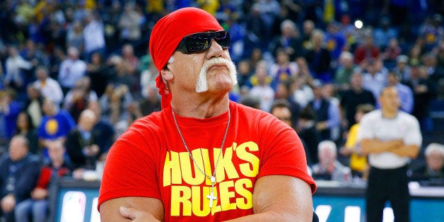 OAKLAND, CA - NOVEMBER 13: Hulk Hogan pumps of the Warriors fans before the start of an NBA basketball game between the Broo