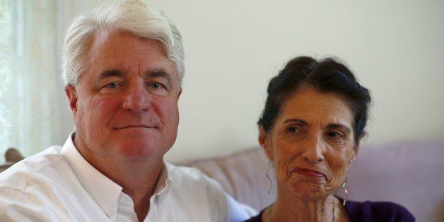 Diane and John Foley, parents of journalilst James Foley, sit for a portrait at their home during an interview August 24, 2014, in Rochester, New Hampshire. A memorial service will be held later August 24 for Foley, a US journalist beheaded by Islamic State fighters after he was kidnapped in Syria in November. AFP PHOTO/DOMINICK REUTER (Photo credit should read DOMINICK REUTER/AFP/Getty Images)