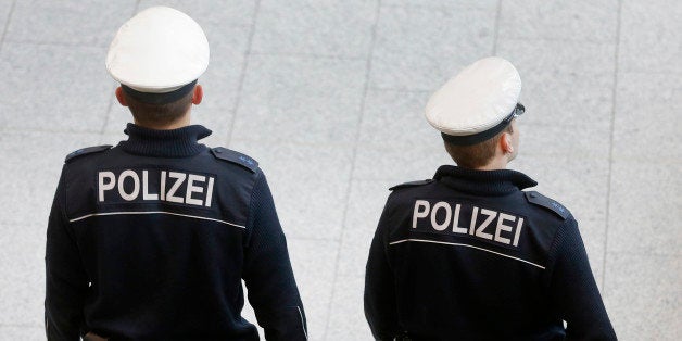 German police officers patrol in a terminal at the airport in Frankfurt, Germany, Monday, Jan. 19, 2015. Security concerns across Europe have been heightened following the terror attacks in Paris, in which 17 people were killed. (AP Photo/Michael Probst)