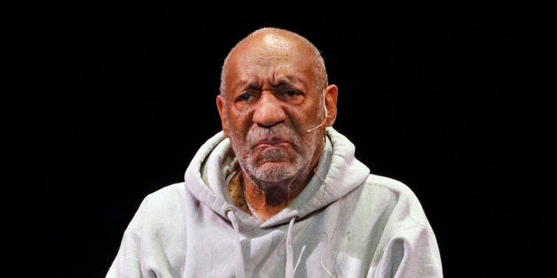 Comedian Bill Cosby performs at the Buell Theater in Denver, Saturday, Jan. 17, 2015. Cosby, 77, is facing sexual assault accusations from at least 15 women, with some of the claims dating back decades. He has denied the allegations through his attorney and has never been charged with a crime. (AP Photo/Brennan Linsley)