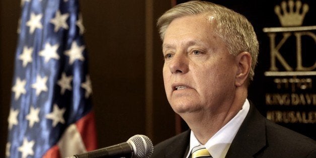 US Senator Lindsey Graham talks to the press during a press conference in Jerusalem on May 27, 2015. AFP PHOTO / MENAHEM KAHA