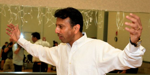 Republican presidential candidate, Louisiana Gov. Bobby Jindal greets participants in a dance class during a visit to a senior center in Council Bluffs, Iowa, Wednesday, July 1, 2015. (AP Photo/Nati Harnik)