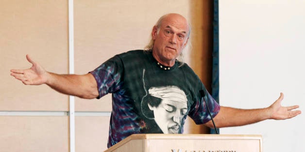 Former Minnesota Gov. Jessie Ventura, wearing a shirt featuring guitarist Jimi Hendrix, speaks at Macalester College Friday, Sept. 21, 2012 in St. Paul, Minn., prior to an address by former New Mexico governor Gary Johnson, who is on a nationwide college tour, part of Johnson's Libertarian Party presidential campaign. (AP Photo/Jim Mone)