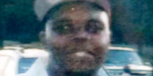 FILE - This undated file photo provided by the Brown family is Michael Brown, 18, who was shot and killed in a confrontation