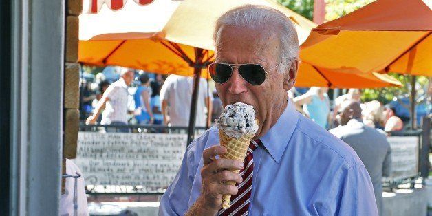 Vice President Joe Biden eats ice cream during a visit to Little Man Ice Cream, in Denver, Tuesday, July 21, 2015. (AP Photo/Brennan Linsley)
