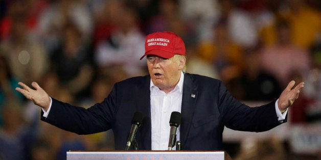 FILE - In this Aug. 21, 2015 file photo, Republican presidential candidate businessman Donald Trump speaks during a campaign pep rally in Mobile, Ala. Alabama is no longer a flyover state for presidential hopefuls. Six GOP presidential candidates are visiting the state over a 10-day period. (AP Photo/Brynn Anderson)