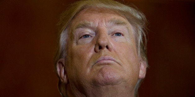 Donald Trump, president and chief executive officer of Trump Organization Inc. and 2016 Republican presidential candidate, pauses while speaking during a news conference at Trump Towers in New York, U.S., on Thursday, Sept. 3, 2015. 'I have signed the pledge,' he said, referring to a document stating that he would not run as an independent candidate in the event that he does not win the Republican nomination. Photographer: Victor J. Blue/Bloomberg via Getty Images 