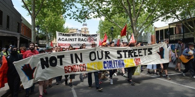 BENDIGO, AUSTRALIA - OCTOBER 10: Hundreds of demonstrators walk with banners during an anti-racism rally as anti-mosque protesters stage a protest in Bendigo, a regional city in Victoria state, Australia on October 10, 2015. (Photo by Recep Sakar/Anadolu Agency/Getty Images)