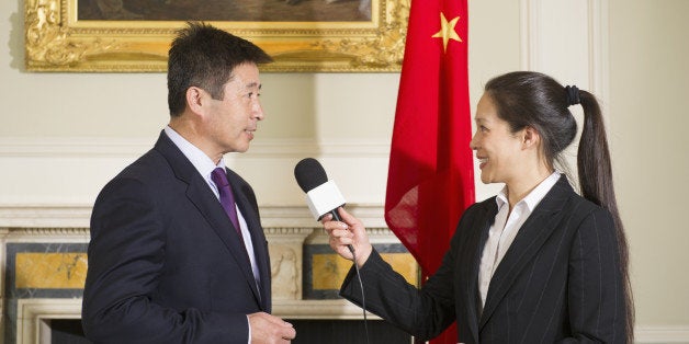 Chinese businessman giving interview