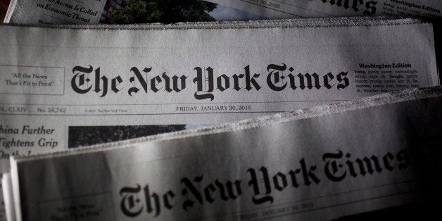 New York Times newspapers are arranged for a photograph in Washington, D.C., U.S., on Friday, Jan. 30, 2015. The New York Times Co. is expected to release fourth-quarter earnings on Feb. 3. Photographer: Andrew Harrer/Bloomberg via Getty Images