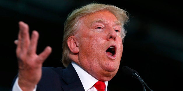 Republican presidential candidate Donald Trump speaks during a campaign event at the University of Iowa Field House, Tuesday,