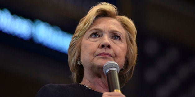 COHOES, NY - APRIL 4: Democratic presidential candidate Hillary R. Clinton pauses while addressing her supporters during the
