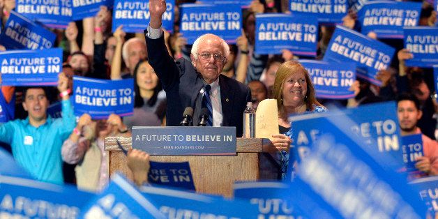 Democratic presidential candidate, Sen. Bernie Sanders, I-Vt., left, and his wife Jane O'Meara Sanders wave to his supporters following a campaign rally at the Lexington Convention Center, Wednesday, May 4, 2016, in Lexington Ky. (AP Photo/Timothy D. Easley)
