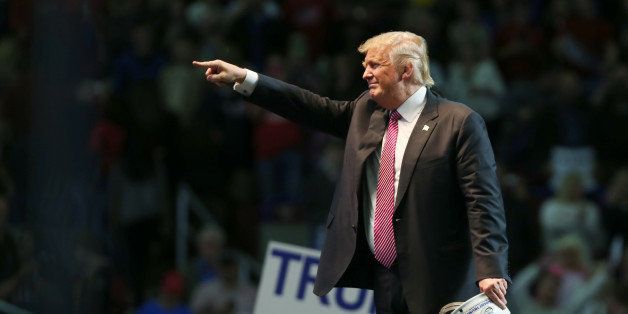 CHARLESTON, WV - MAY 05: Republican Presidential candidate Donald Trump points to supporters following his speech at the Charleston Civic Center on May 5, 2016 in Charleston, West Virginia. Trump became the Republican presumptive nominee following his landslide win in indiana on Tuesday.(Photo by Mark Lyons/Getty Images)