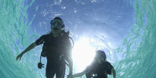 Couple scuba diving