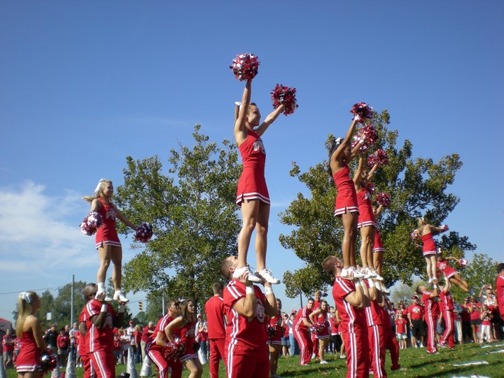 COLUMBUS, OHIO - SEPTEMBER 18: The Ohio State cheerleaders entertain the crowd before their game against the OU Bobcats on September 18, 2010 in Columbus, OH.