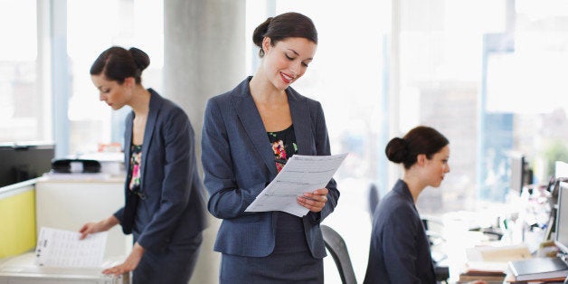 Sequence of businesswoman working in office