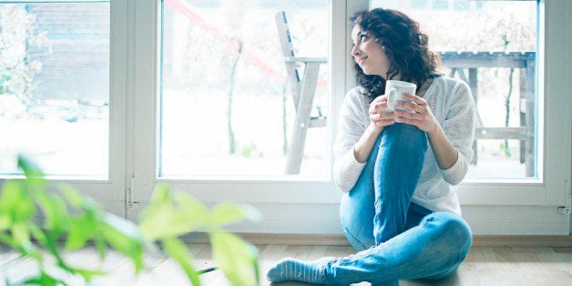 Woman thinking about writing her diary.