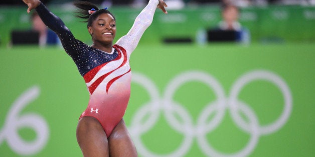 U.S. gymnast Simone Biles competes in the floor exercise on Tuesday, Aug. 9, 2016, at the Rio Olympic Games in Rio De Janeiro, Brazil. The U.S. women's squad captured the gold medal in the team competition. (Mark Reis/Colorado Springs Gazette/TNS via Getty Images)