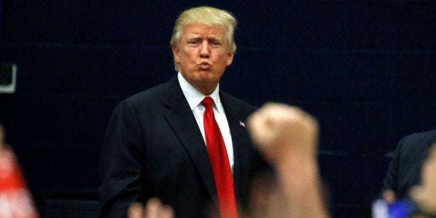 Republican presidential nominee Donald Trump blows a kiss to supporters following a campaign rally in Akron, Ohio, U.S., Augu