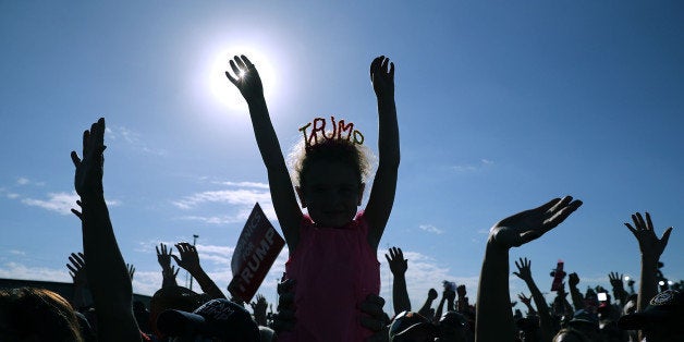 ORLANDO, FL - NOVEMBER 02: Amelia Good, 6, wears a crown made from pipe cleaners during a campaign rally with Republican pre