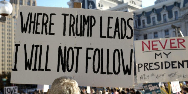 Philadelphia, Pennsylvania, United States - November 19, 2016: Protesters carry signs during ongoing Anti-Trump protests, with more then a thousand participating, on Nov. 19, 2016, in Center City Philadelphia, PA.