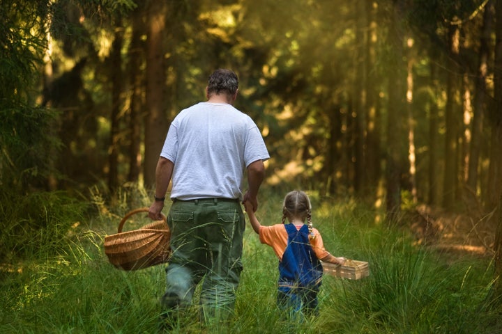 father and daughter going on a mushroom foray