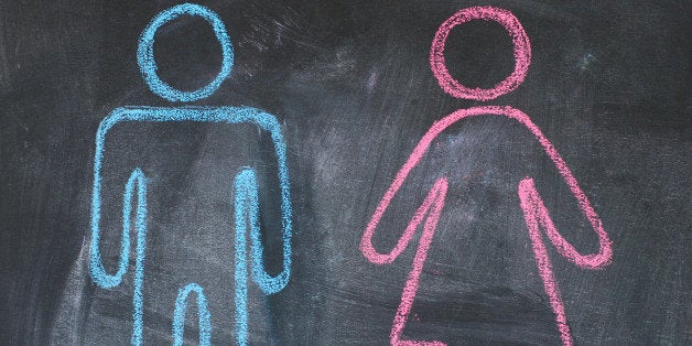 Figures of man and woman on a blackboard, chalk drawing