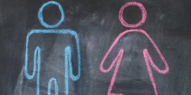 Figures of man and woman on a blackboard, chalk drawing