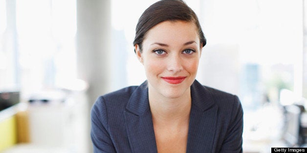 Smiling businesswoman in office