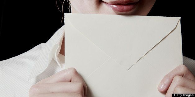 woman with envelope,close-up