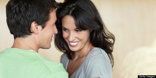 Smiling couple standing together