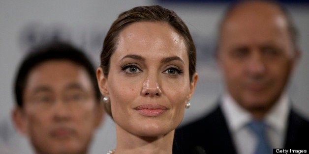 LONDON, ENGLAND - APRIL 11: Actress Angelina Jolie, in her role as UN envoy, talks during a news conference regarding sexual violence against women in conflict, at the Foreign Ministers G8 meeting in Lancaster House on April 11, 2013 in London, England. G8 Foreign Ministers are holding a two day meeting where they will discuss the situation in the Middle East, including Syria and Iran, security and stability across North and West Africa, Democratic People's Republic of Korea and climate change. British Foreign Secretary William Hague will also highlight five key policy priorities. (Photo by Alistair Grant - WPA Pool/Getty Images)