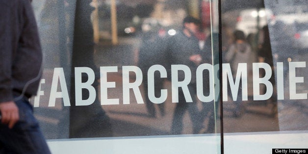 SAN FRANCISCO, CA - FEBRUARY 22: A man walks past an Abercrombie and Fitch store on February 22, 2013 in San Francisco, California. Clothing retailer Abercrombie and Fitch reported a surge in fourth quarter revenue with earnings of $157.2 million, or $1.95 per share compared to $45.8 million, or 52 cents per share one year ago. (Photo by Justin Sullivan/Getty Images)