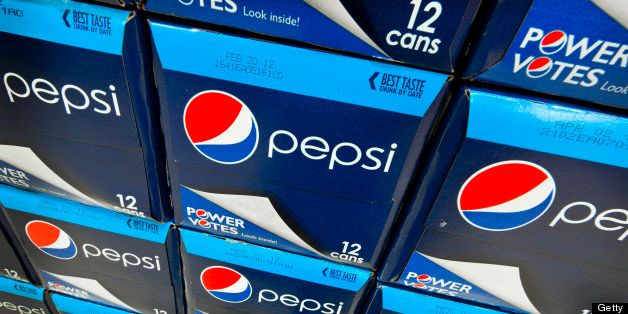 Boxes of PepsiCo Inc. Pepsi cola are displayed for sale at a ShopRite Holdings Ltd. grocery store in Stratford, Connecticut, U.S., on Wednesday, Aug. 3, 2011. PepsiCo Inc. reported growth for the second quarter of 2011 partly due to the acquisition of Wimm-Bill-Dann, the leading dairy and juice company in Russia. Photographer: Paul Taggart/Bloomberg via Getty Images 