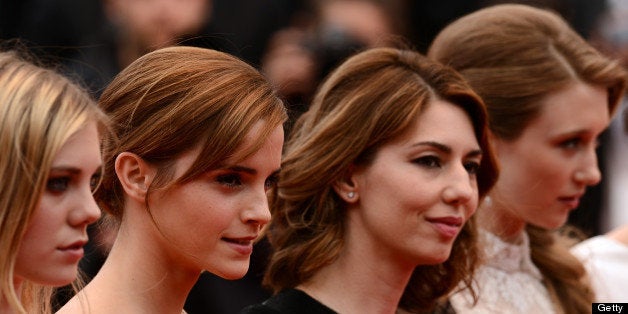 CANNES, FRANCE - MAY 16: (L-R) Actresses Claire Julien, Emma Watson, director Sofia Coppola and Taissa Farga attend 'The Blin