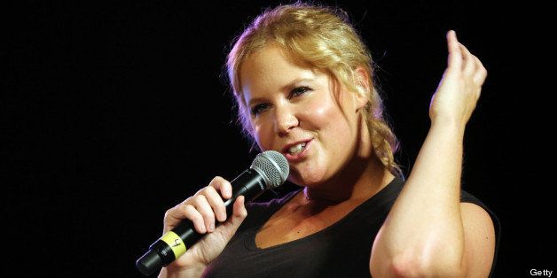 NEW YORK, NY - JUNE 26: Comedian Amy Schumer performs on stage at 'Comedy Central's Stars Under the Stars' at Central Park SummerStage on June 26, 2013 in New York City. (Photo by Neilson Barnard/Getty Images for Comedy Central)