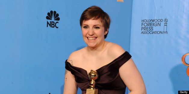 BEVERLY HILLS, CA - JANUARY 13: Writer/director Lena Dunham poses with Best Actress in a TV Comedy Award in the press room during the 70th Annual Golden Globe Awards held at The Beverly Hilton Hotel on January 13, 2013 in Beverly Hills, California. (Photo by Kevin Winter/Getty Images)