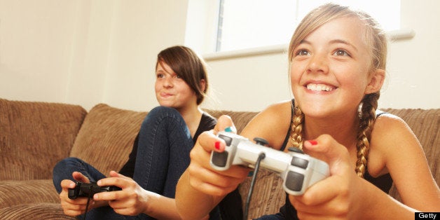 Two girls playing video game