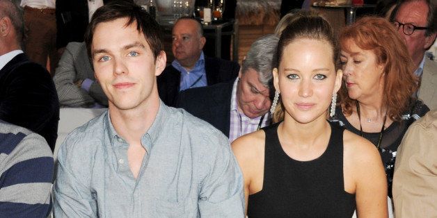 MONACO - MAY 25: (EMBARGOED FOR PUBLICATION IN UK TABLOID NEWSPAPERS UNTIL 48 HOURS AFTER CREATE DATE AND TIME. MANDATORY CREDIT PHOTO BY DAVE M. BENETT/GETTY IMAGES REQUIRED) Actors Nicholas Hoult (L) and Jennifer Lawrence attend a cocktail reception during Amber Lounge Fashion Monaco 2012 at Le Meridien Beach Plaza Hotel on May 25, 2012 in Monaco, Monaco (Photo by Dave M. Benett/Getty Images)