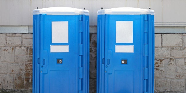 two portable toilet cabins at...