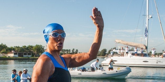 US swimmer Diana Nyad waves before attempting to swim in a three-day non-stop journey from Havana to Florida at the Ernest Hemingway Nautical Club, in Havana on August 31, 2013. AFP PHOTO/YAMIL LAGE (Photo credit should read YAMIL LAGE/AFP/Getty Images)