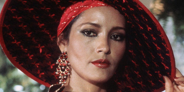 Barbara Carrera touching hat in a scene from the film 'Never Say Never', 1983. (Photo by Warner Brothers/Michael Ochs Archive
